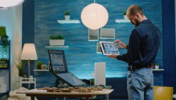 architect-looking-tablet-with-building-model-development-man-engineer-holding-gadget-analyzing-constru