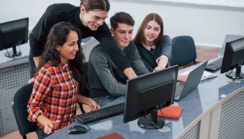 everything-will-be-awesome-group-young-people-casual-clothes-working-modern-office (1)