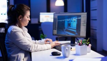 videographer-working-powerful-computer-from-creative-office-editing-video-audio-footage-late-night (1)